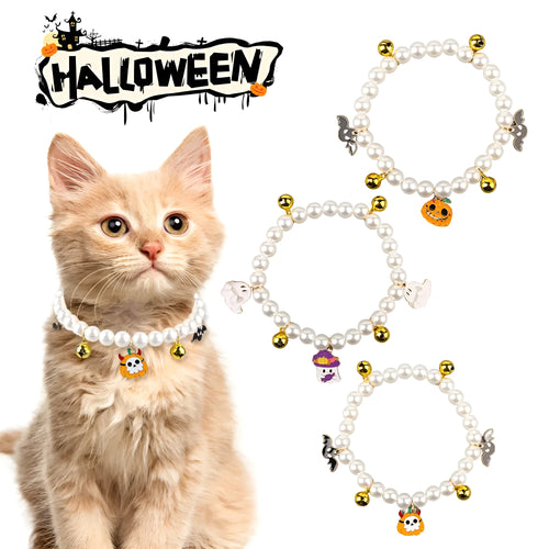 Purple simulated pearl cat collar with three Halloween pumpkin charms: ghost, skull, and smiley face.