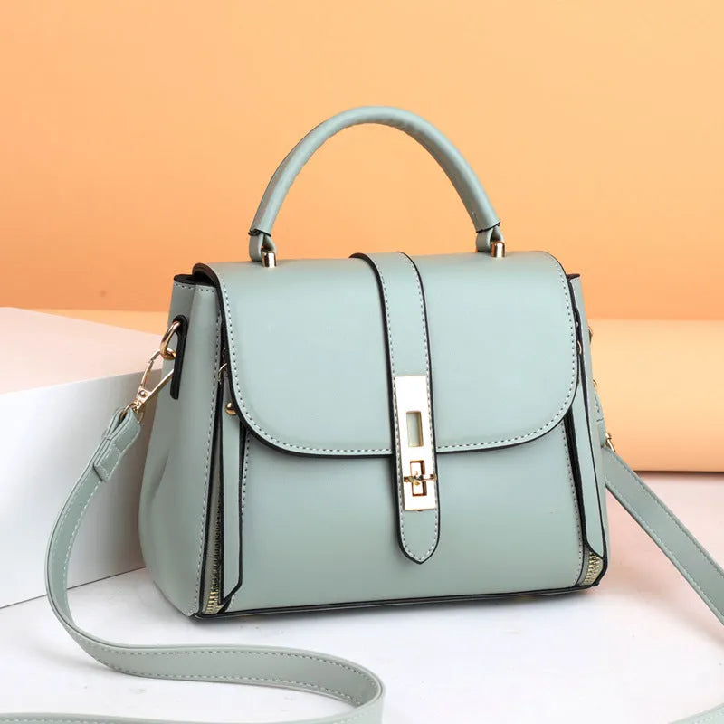 Women's soft leather shoulder bag in messenger style with adjustable strap