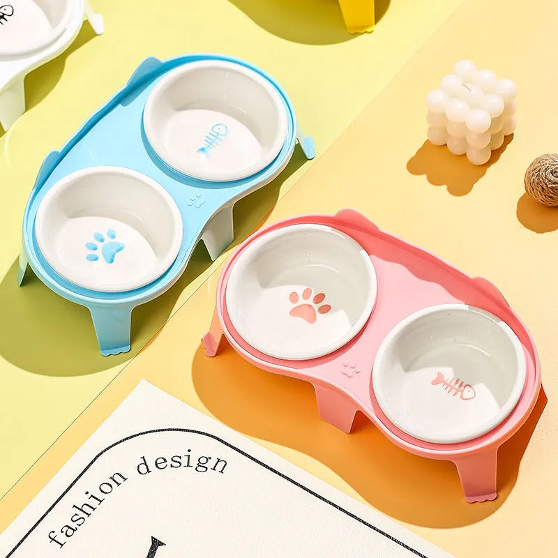 Ceramic cat food and water bowl set on elevated tilted ABS plastic stand in blue colour