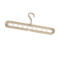 Multifunctional plastic nine-hole folding hanger for trousers, shown in beige, blue, green, pink, and grey colour options.
