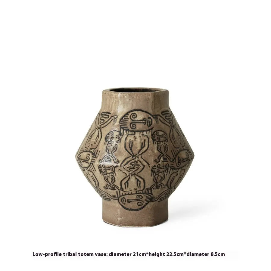 Hand-painted ceramic vase with carved tribal totem flower pattern in cylindrical shape