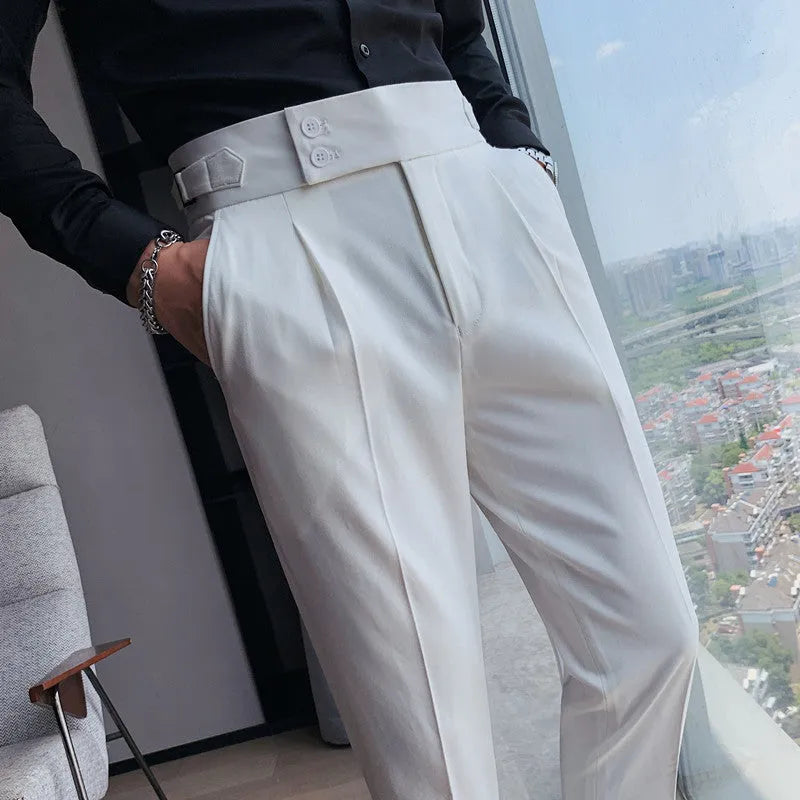 Men's straight leg casual trousers in solid colours including black and grey on a hanger.