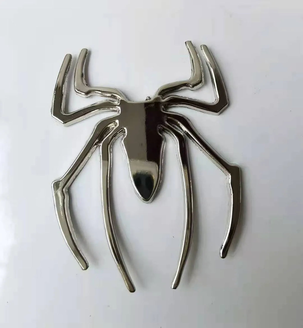 Gold zinc alloy metal spider decorative sticker on a white background