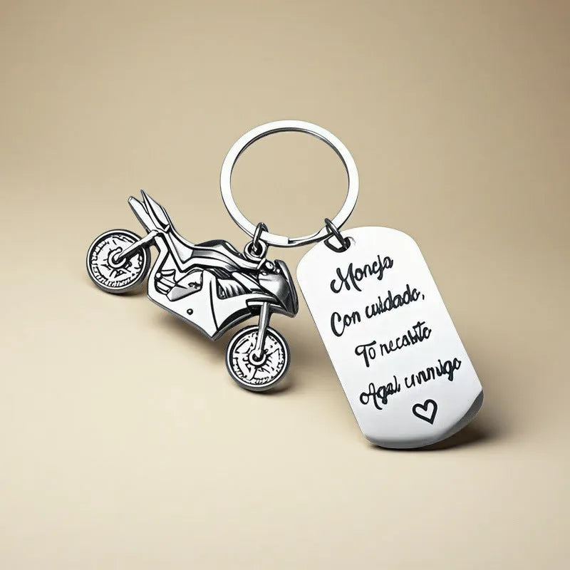 Stainless steel motorcycle keychain with velvet gift pouch in modern minimalist design