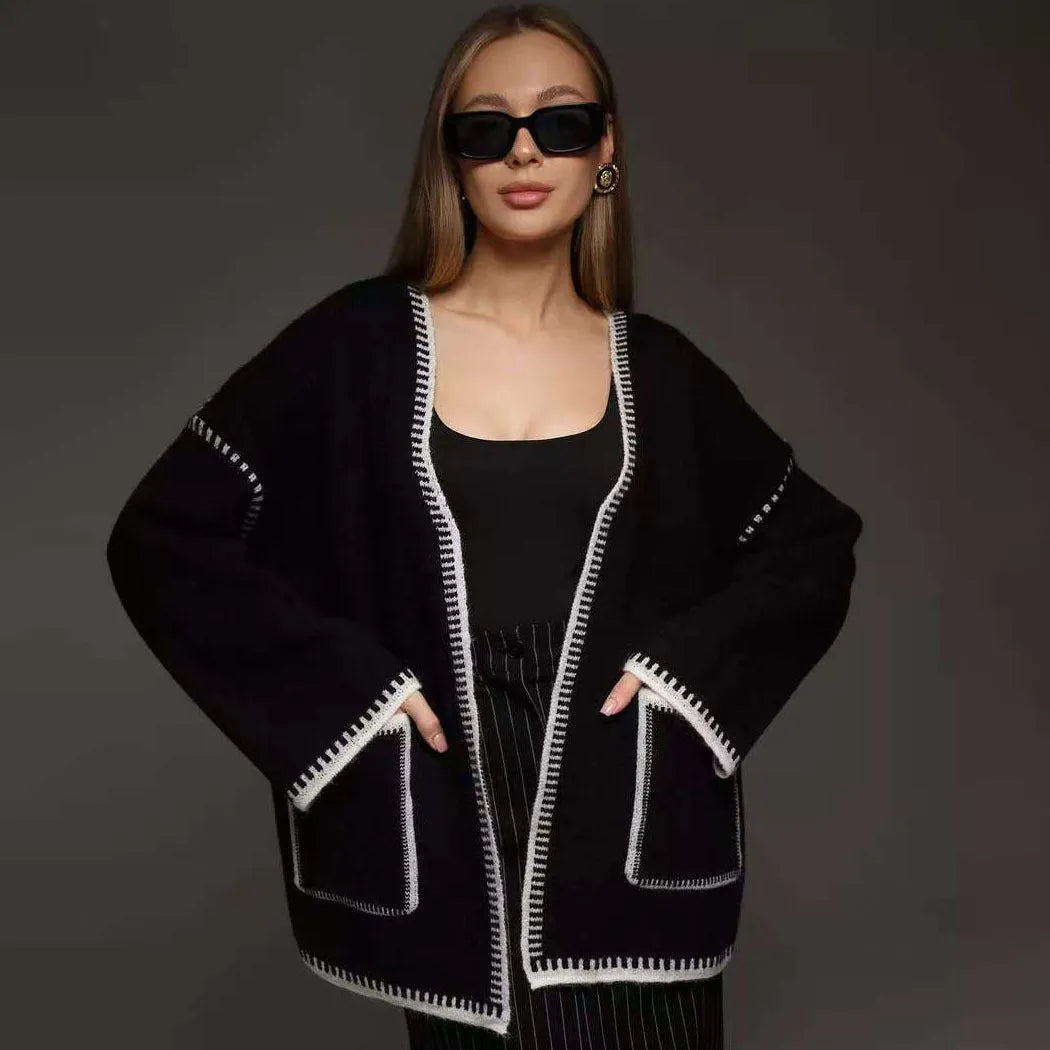 Loose mid-length knitted cardigan with lace-up front closure in cotton imitation cashmere fabric