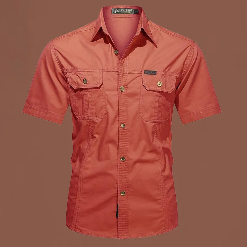 Men's loose fit cotton short sleeve work shirt in cardigan style on a hanger