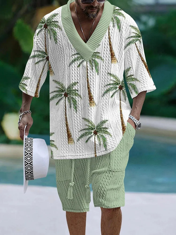 Man wearing a loose blue short sleeve top and matching casual shorts from a polyester suit set.