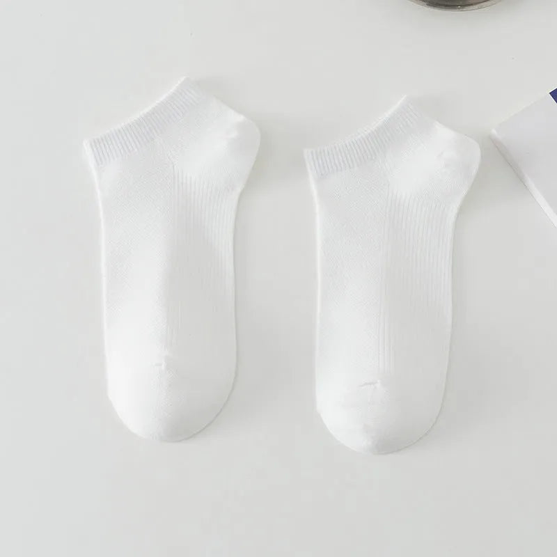 Solid colour low-cut polyester boat socks for men, shown in one of six available colour variants.