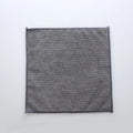 Grey square microfiber kitchen cleaning cloth for oil and grease.