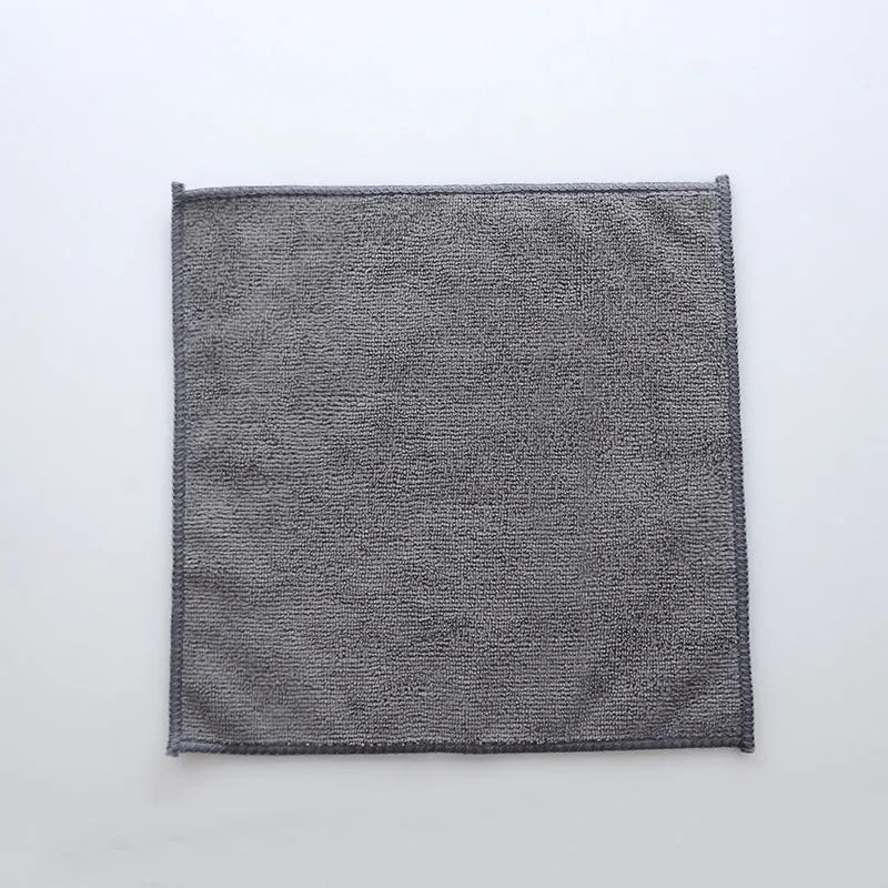 Grey square microfiber kitchen cleaning cloth for oil and grease.