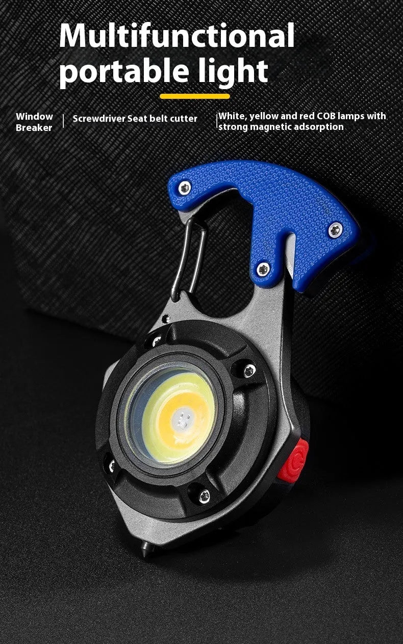 Compact multifunctional keychain torch showing COB light array, keyring, and built-in window breaker and screwdriver tools.