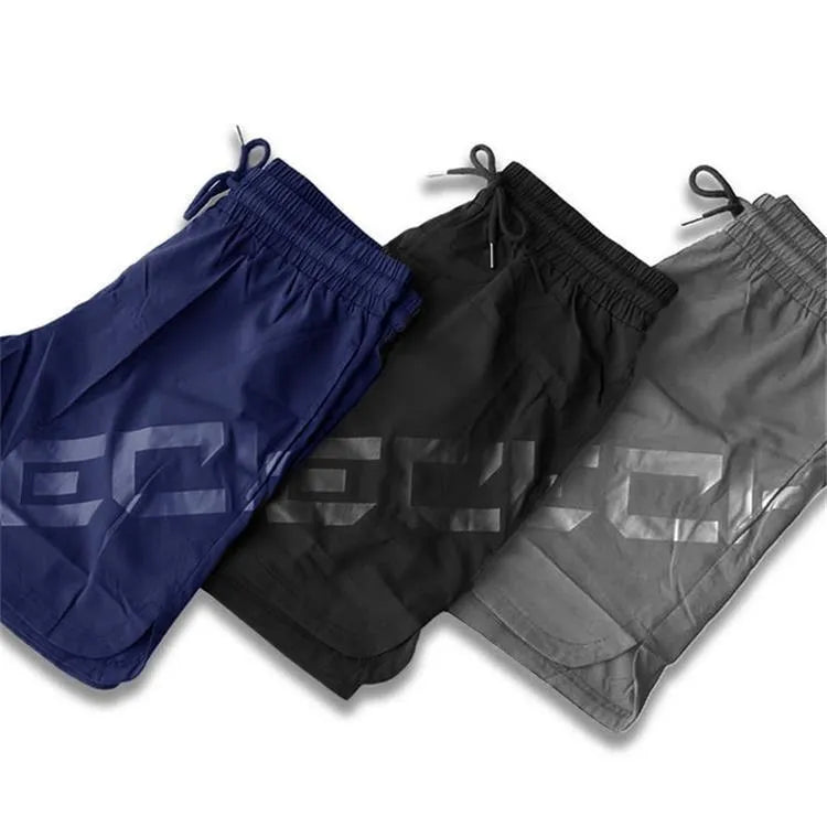 Men's elastic thin running shorts in black, dark grey, navy blue and white colours, knee length with quick-dry fabric