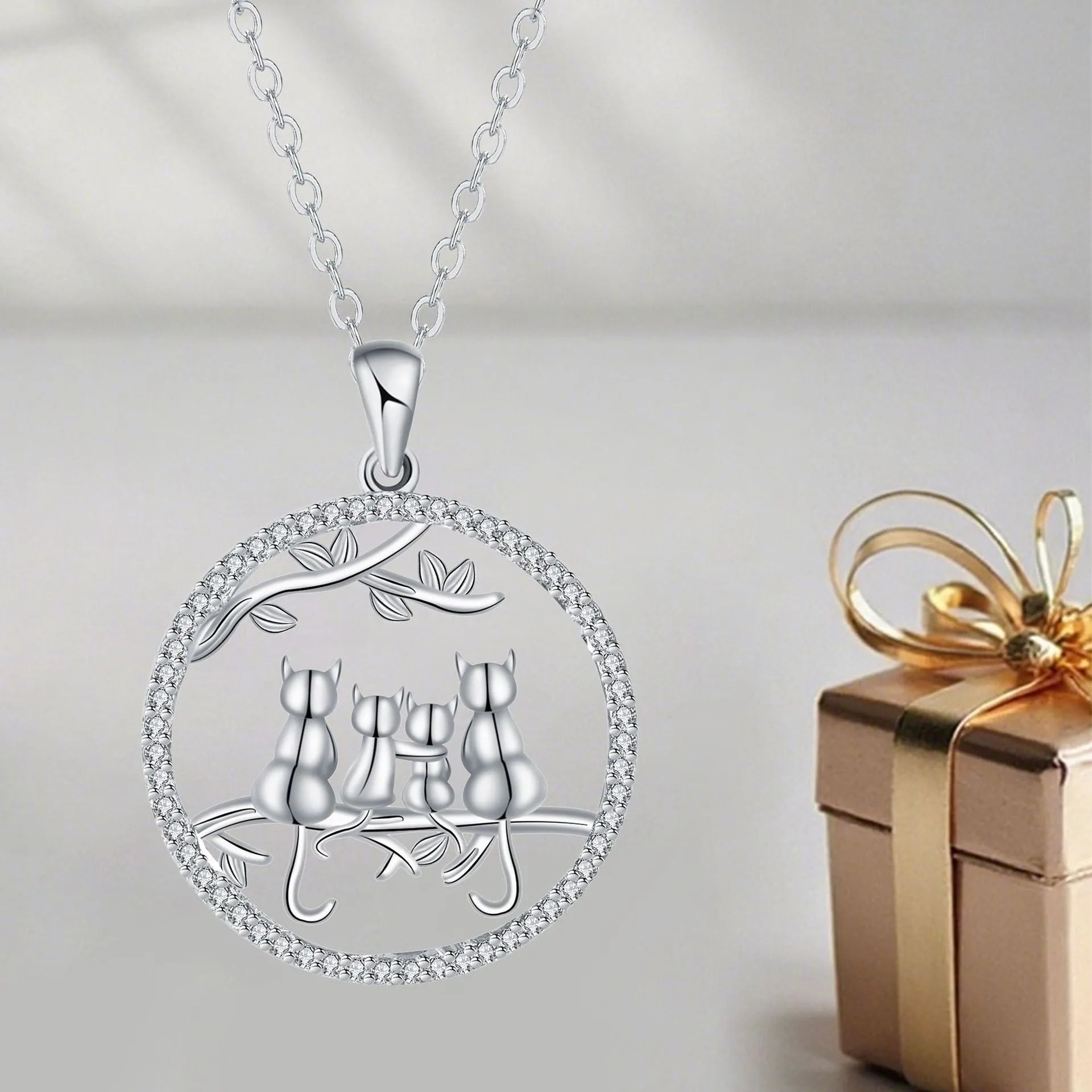 Copper necklace with four kitten pendant on cross chain for women