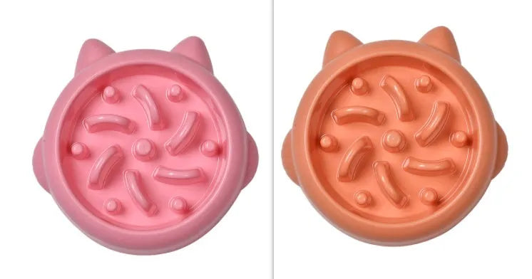 Green slow feeder dog bowl with raised bone-shaped ridges inside