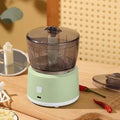 Mini electric meat grinder food processor in white or light green with transparent cup