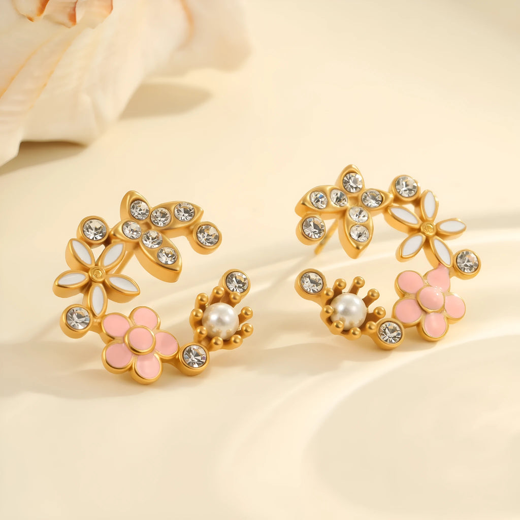 Flower-shaped stud earrings with colourful oil accents and petal elements on 18K gold electroplated stainless steel