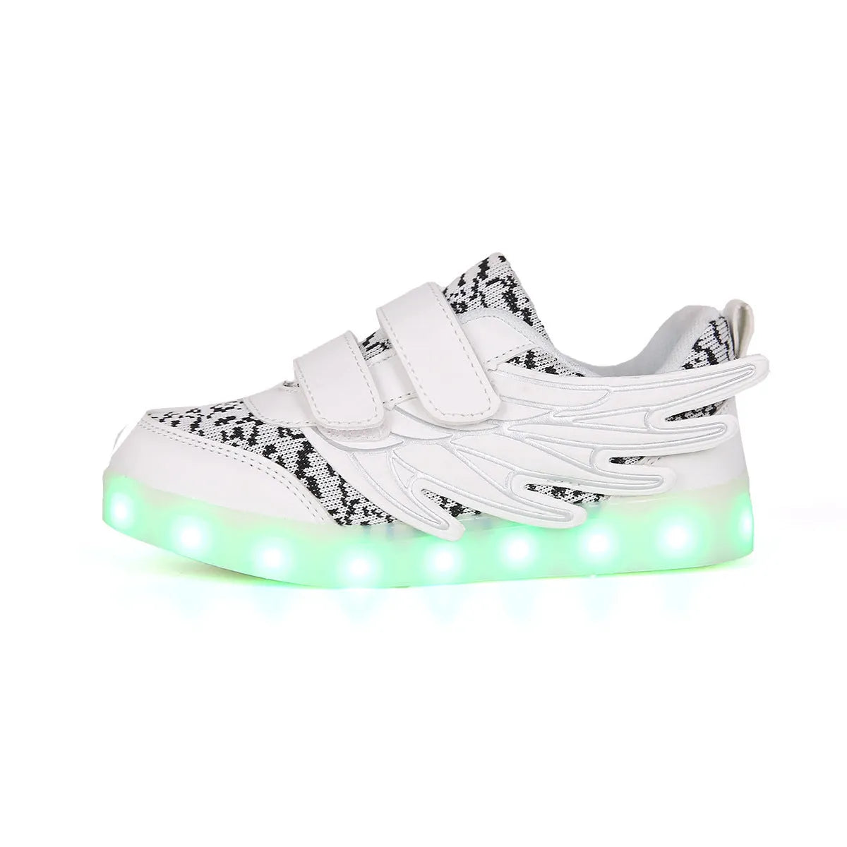 Children's plum red sneakers with multicolour LED lights glowing on the soles.