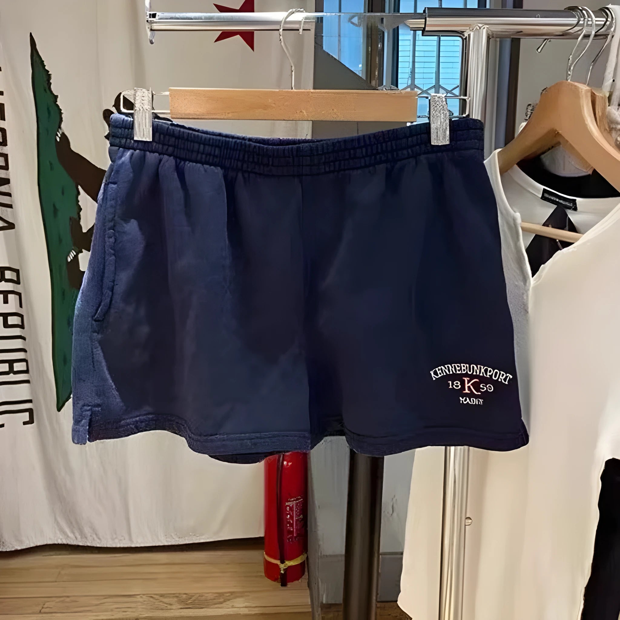 Women's dark blue cotton sports shorts with white flag embroidery design