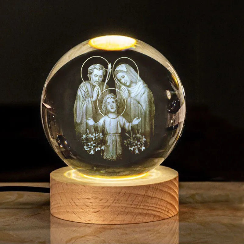 White crystal lamp with 6cm diameter orb on solid wood warm light base showing religious ornamentation
