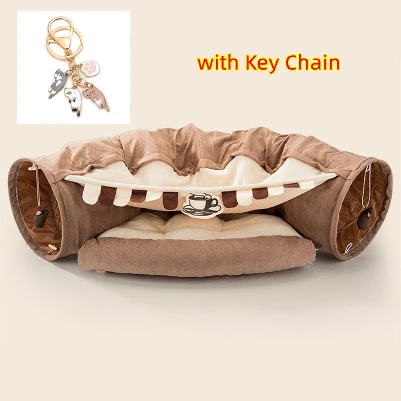 Collapsible cloth cat tunnel in Pink colour, shown extended for play.