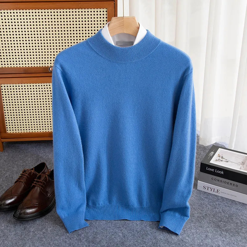 Men's loose fit half-turtleneck wool sweater in a neutral colour on a hanger.