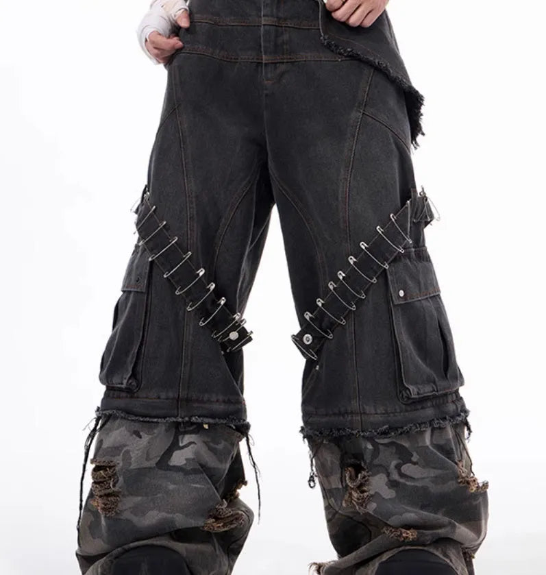 Men's grey cotton jeans with a camouflage splicing pattern, pin accents, and ribbon trim details.