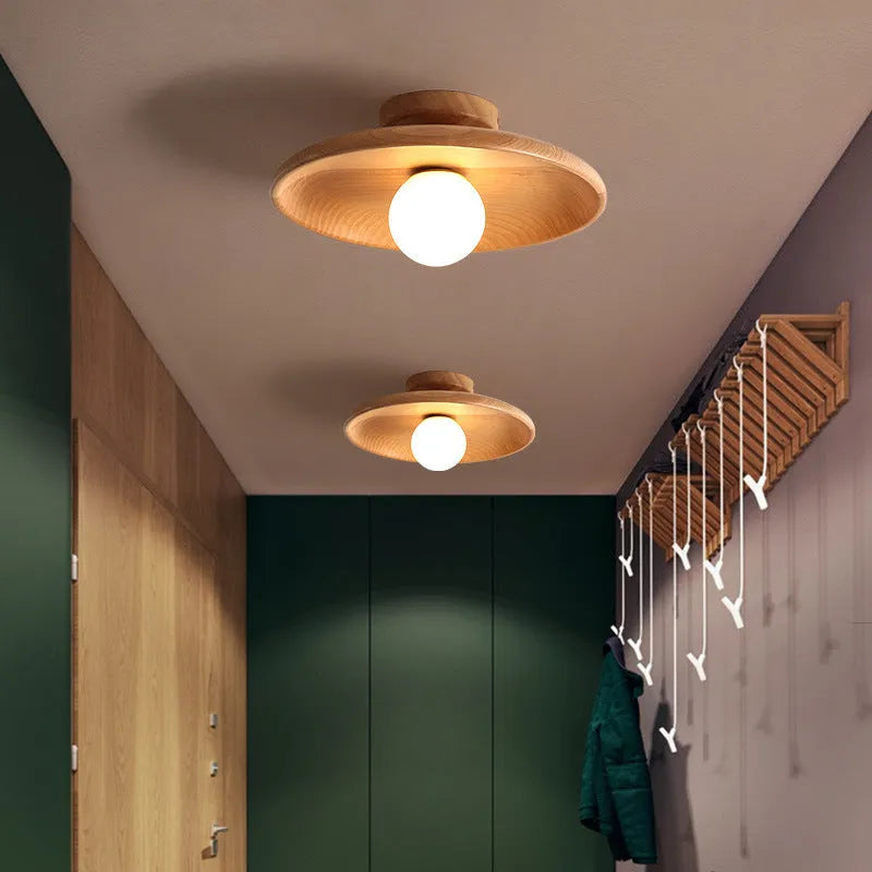Modern solid wood and glass ceiling lamp in walnut colour showing three size options.