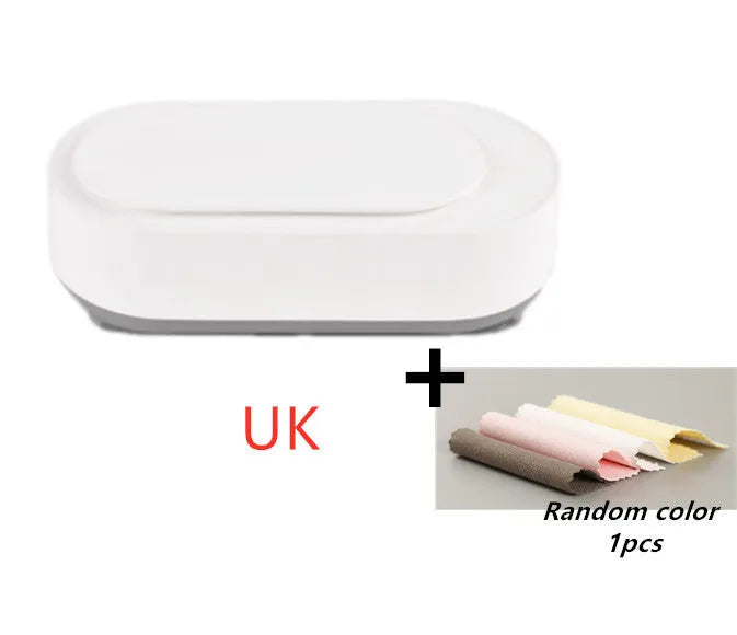 White portable ultrasonic cleaning machine with stainless steel tank for jewellery and glasses.