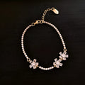 Gold copper bracelet with geometric design and inlaid zircon stones for women
