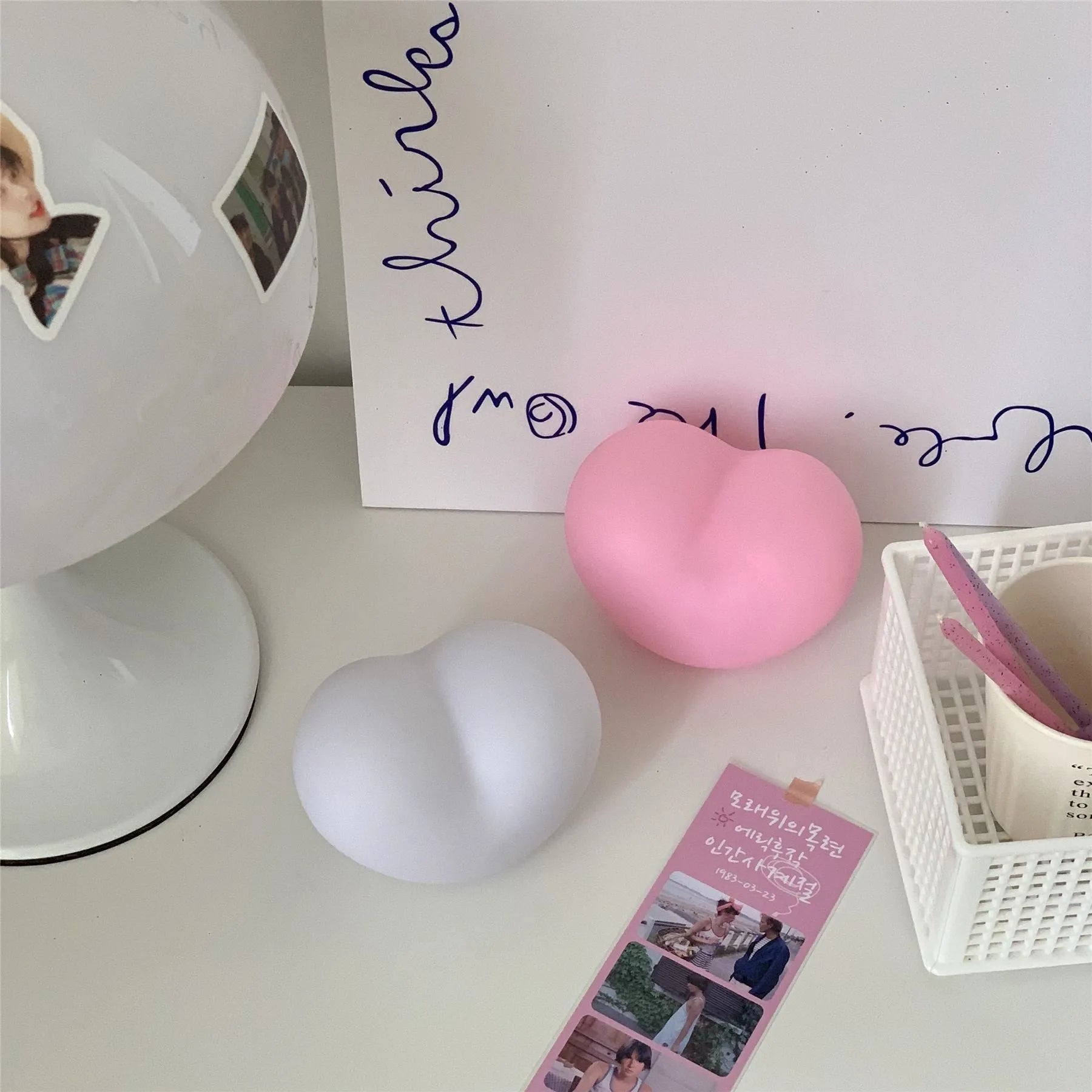 White and pink vinyl atmosphere lamps showing small and large size options for decorative lighting