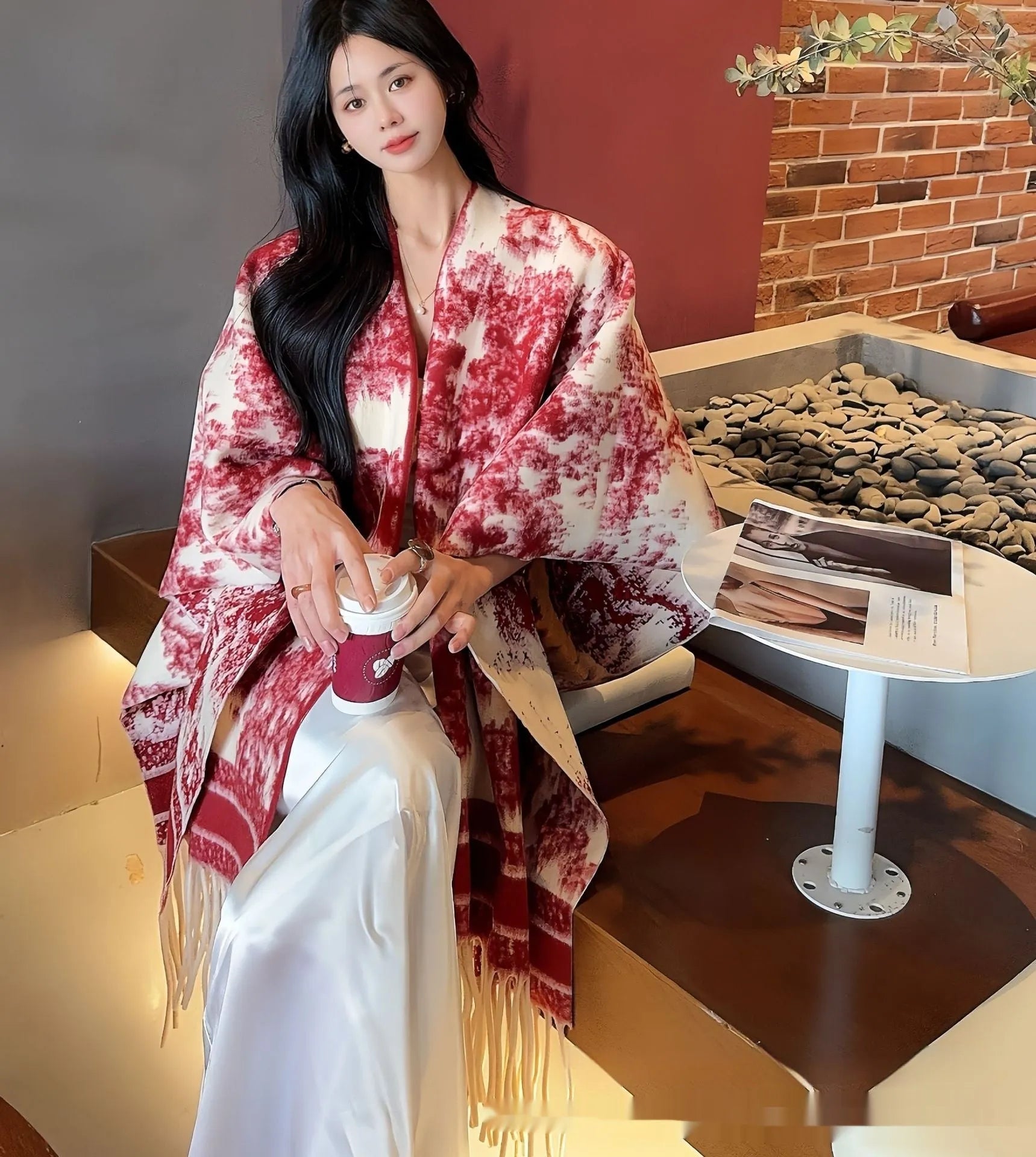 Women's polyester scarf cape with tassel edges worn as shawl in casual style
