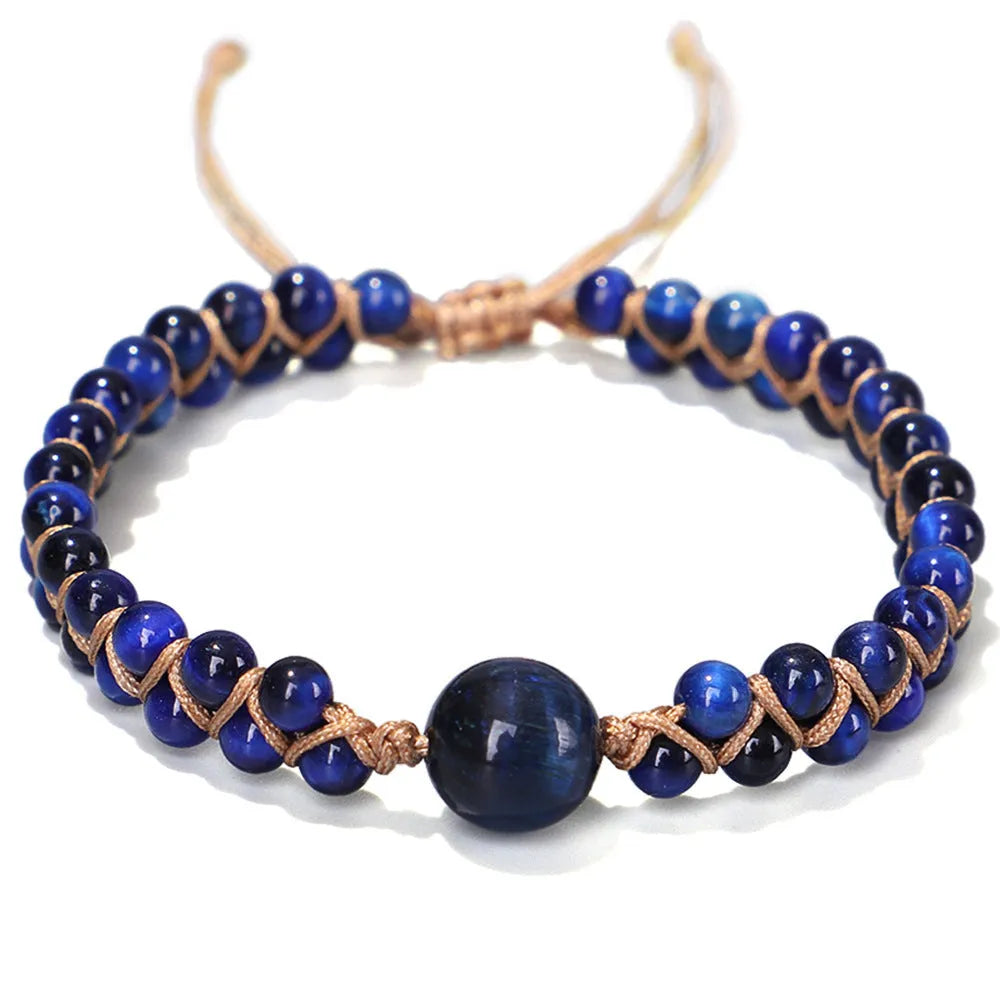 Handmade woven geometric bracelet with a blue Tigereye stone bead and pull design.