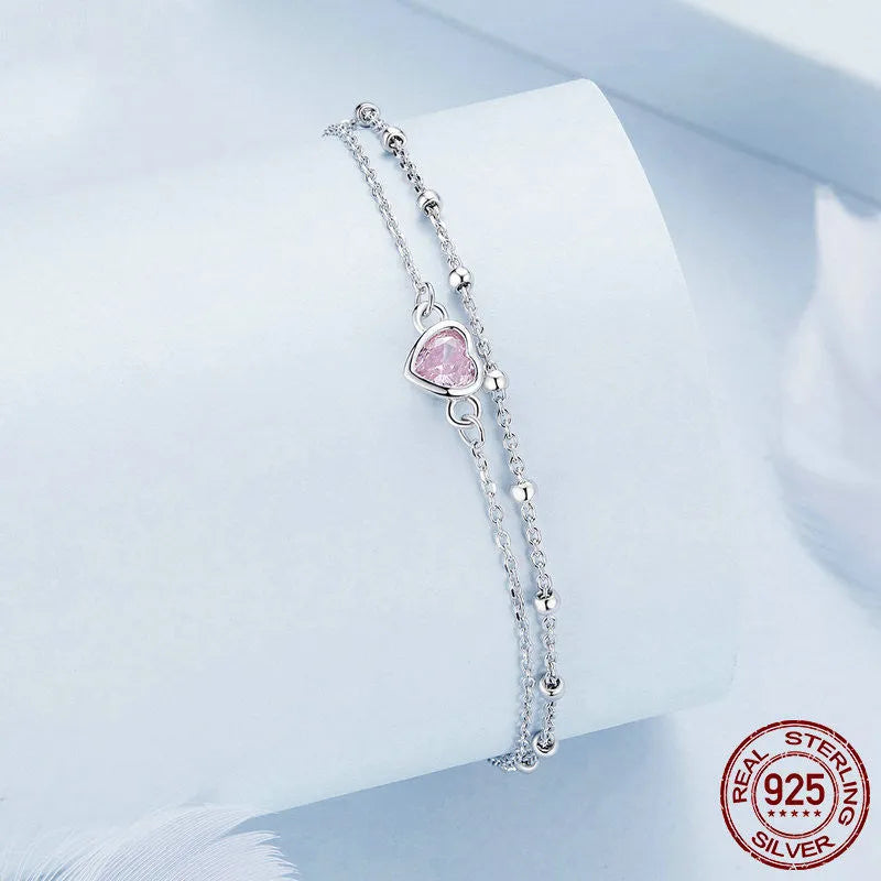 Women's sterling silver heart bracelet with adjustable chain and 6mm pendant