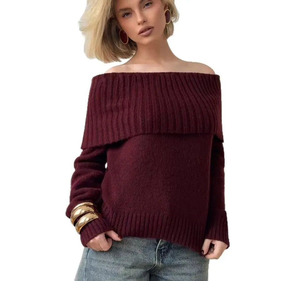 Grey off-the-shoulder sweater with a 3D textured pattern and strapless design.