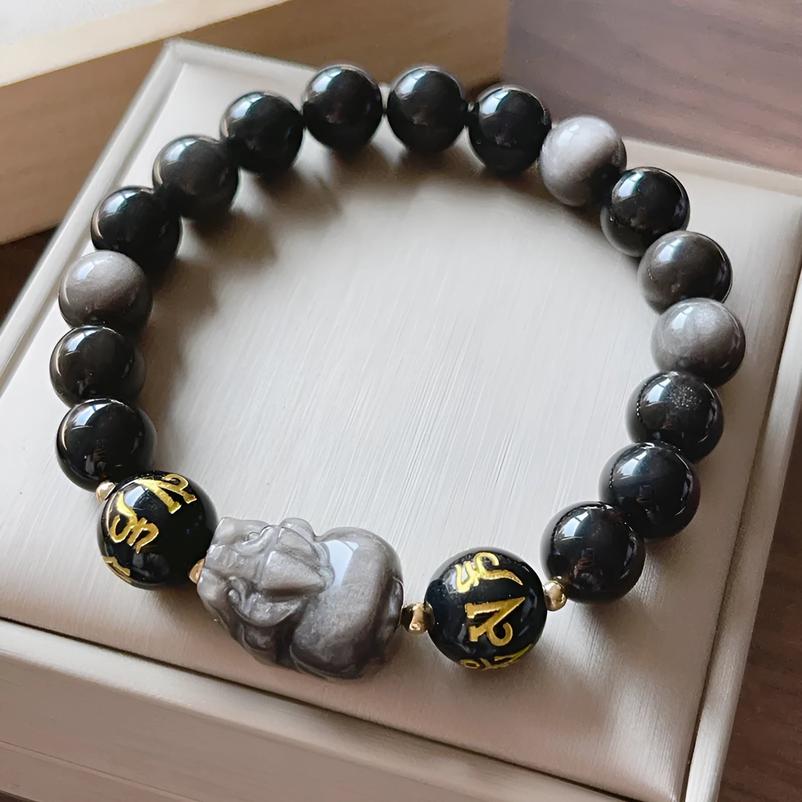 Silver stone men's bracelet with Chinese beaded design and engraved proverbs