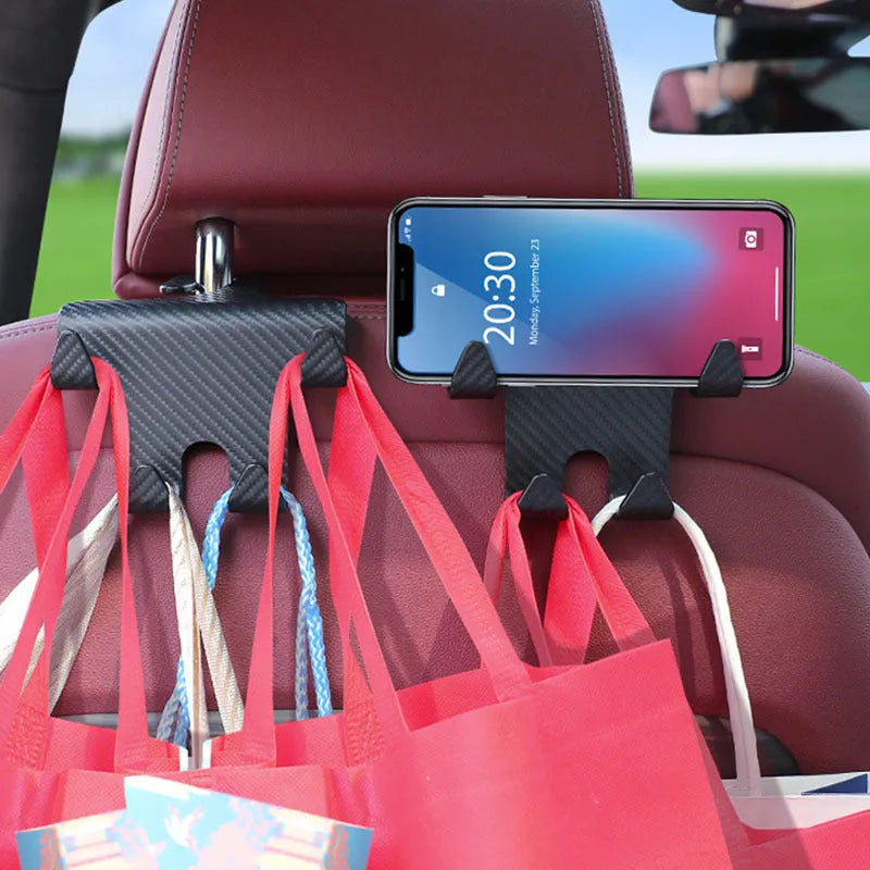 Black carbon fibre style car hook with integrated phone bracket measuring 11.5 by 8.1 by 4.7 centimetres