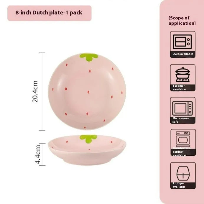 Porcelain dinnerware set with strawberry design showing plates, flower bowls, and twist spoon