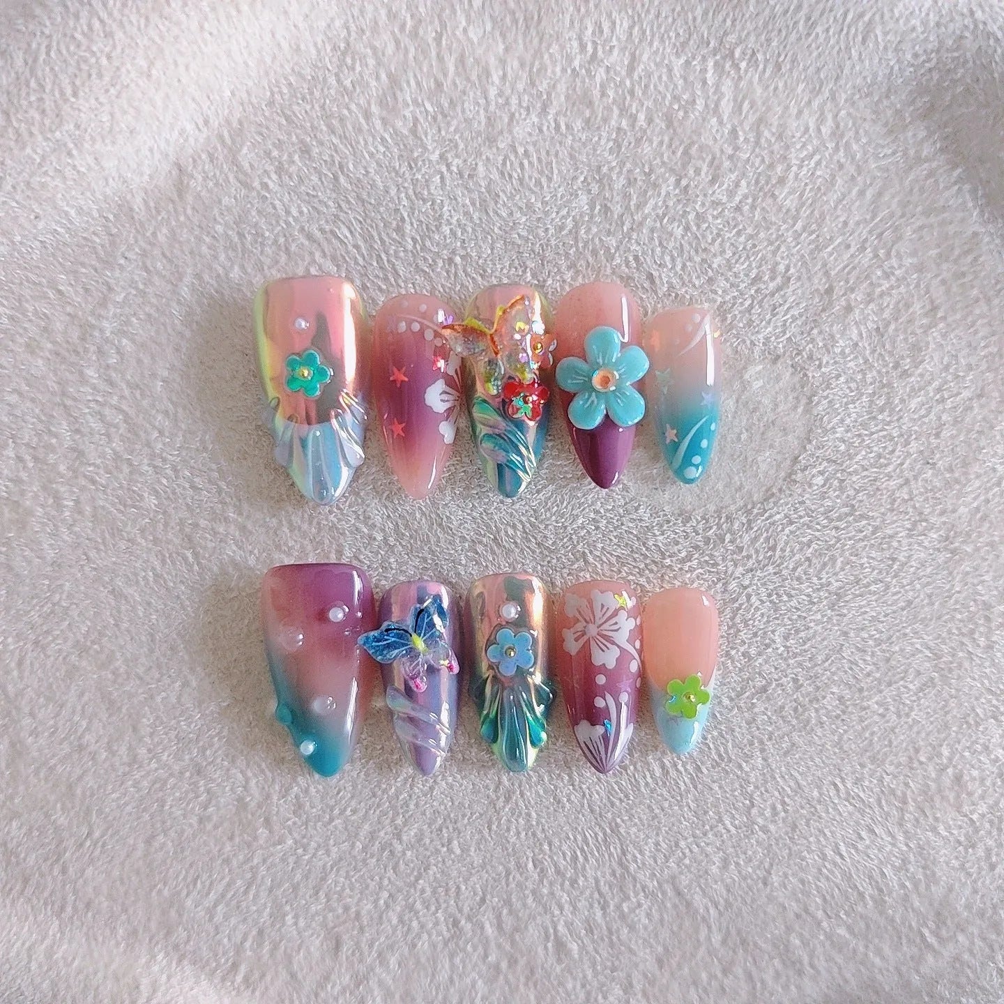 Handmade colourful sculpture manicure set with embossed flower and butterfly designs for gel nail art
