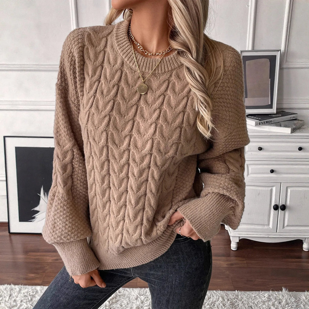 Women's khaki loose pullover sweater with round neck and twist detail on solid colour fabric