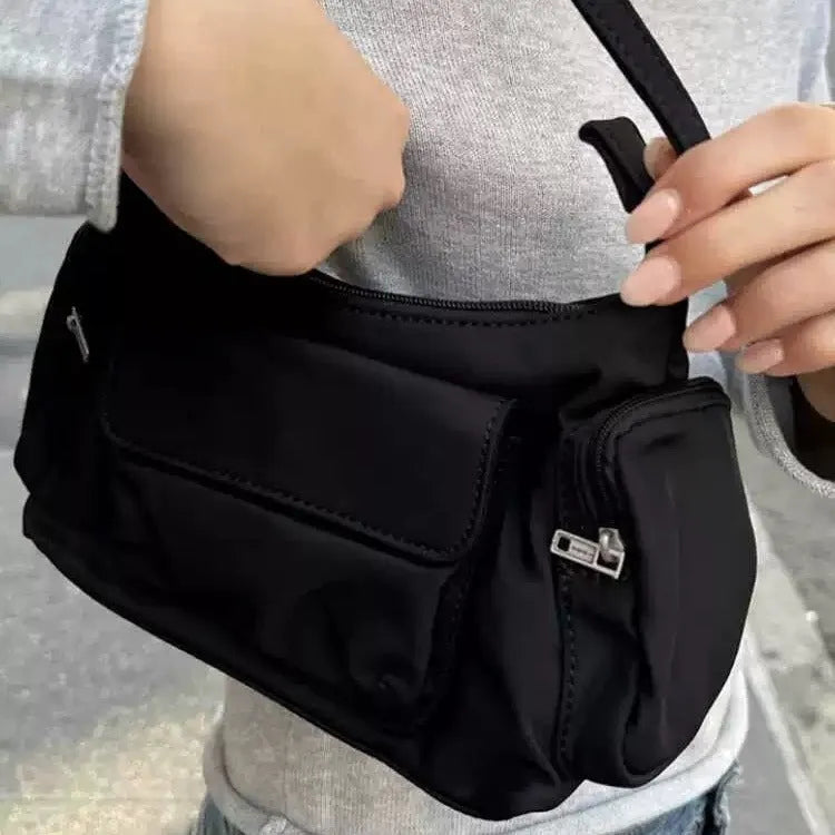 Black PU lightweight shoulder bag with two pockets and side line detail
