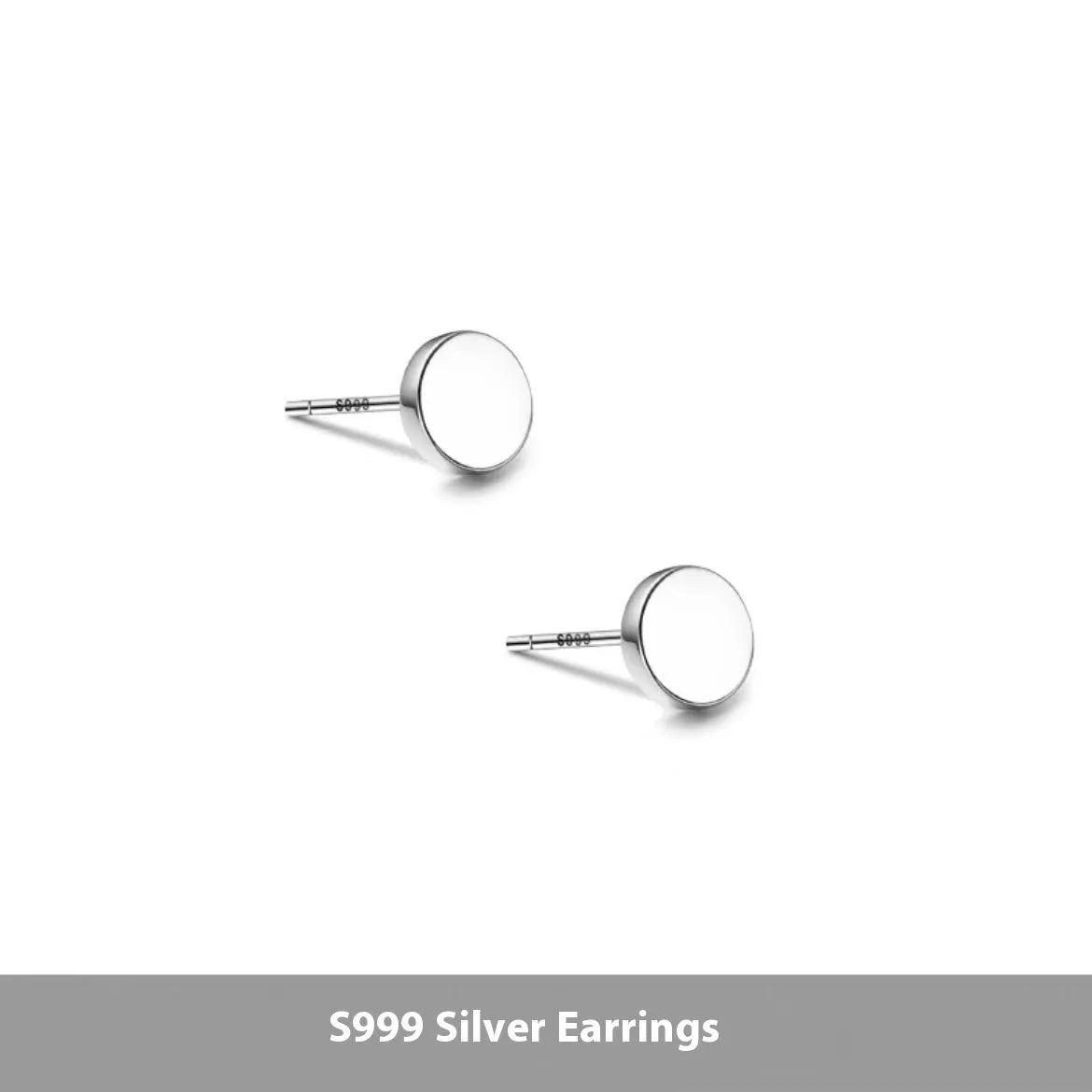 A pair of simple, round, flat-fronted S999 sterling silver ear bone studs on a plain background.