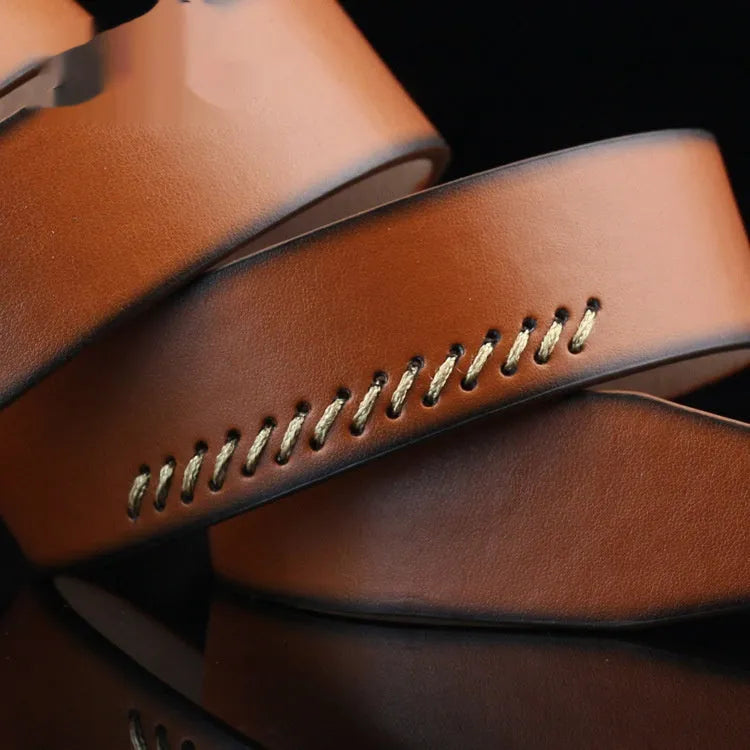 Men's retro style casual belt with pin buckle and pattern detail on imitation leather strap.