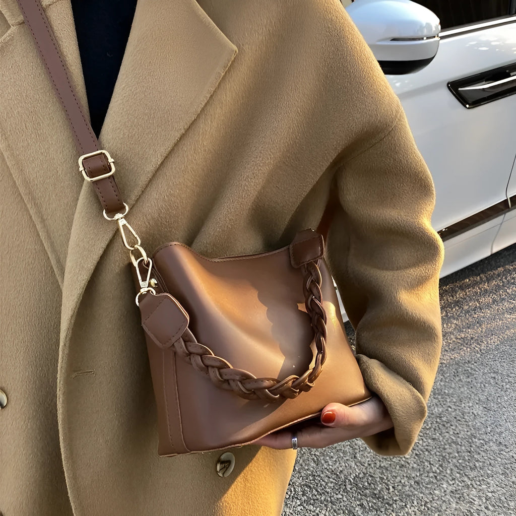 Retro woven PU leather unisex crossbody bucket bag in khaki colour.