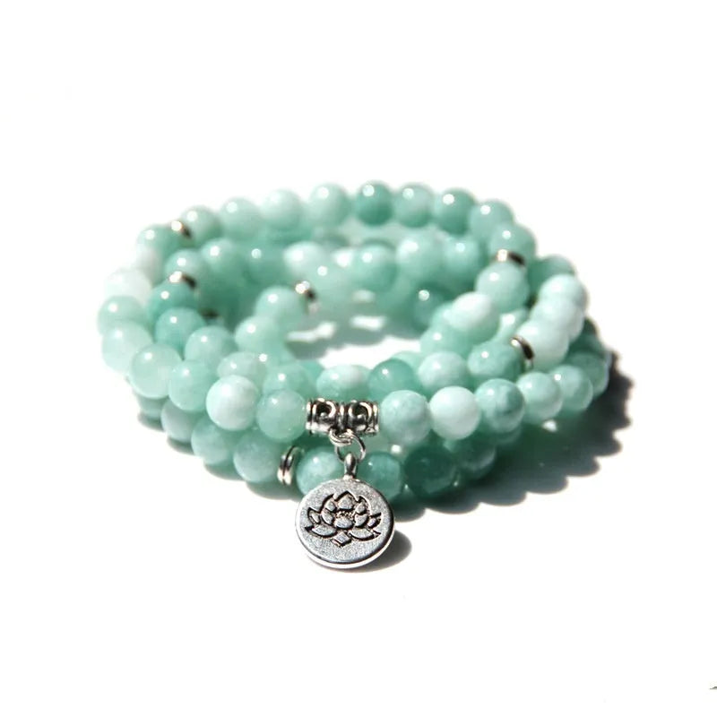 Women's vintage-style bracelet with a natural stone angel echeveria lotus pendant on a chain.