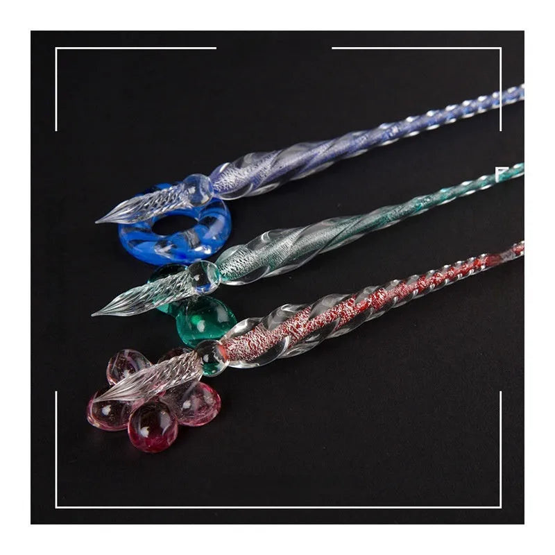 Transparent coloured glass crystal pen with water art ink in gift box, shown in multiple colour options.