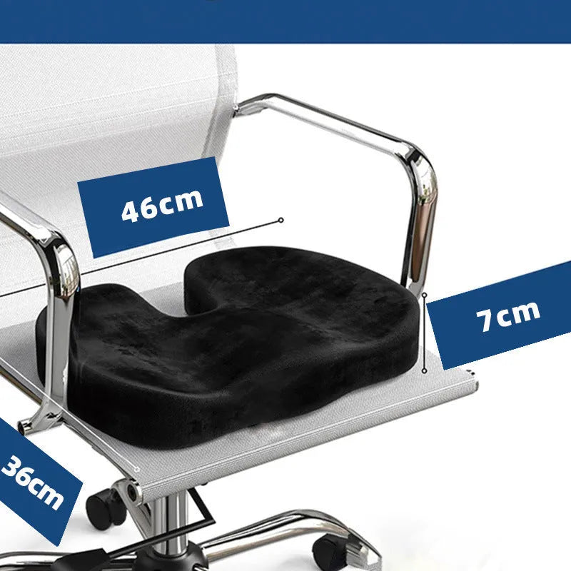 Black U-shaped memory foam office seat cushion showing contoured design for hip support