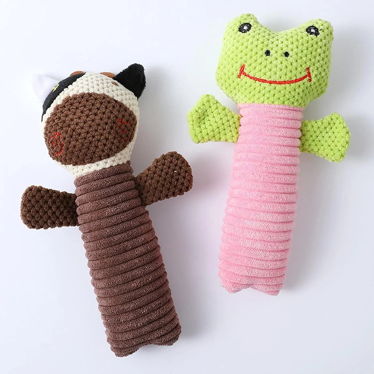 A cloth stuffed animal dog chew toy with a squeaker, shown next to a ruler measuring 19 cm in length.