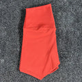 Women's high-waisted yoga shorts in nylon fabric, available in multiple colours