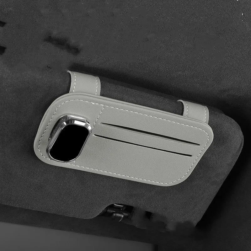 Leather car sun visor card holder with sunglasses clip in snap-on design available in multiple colours.