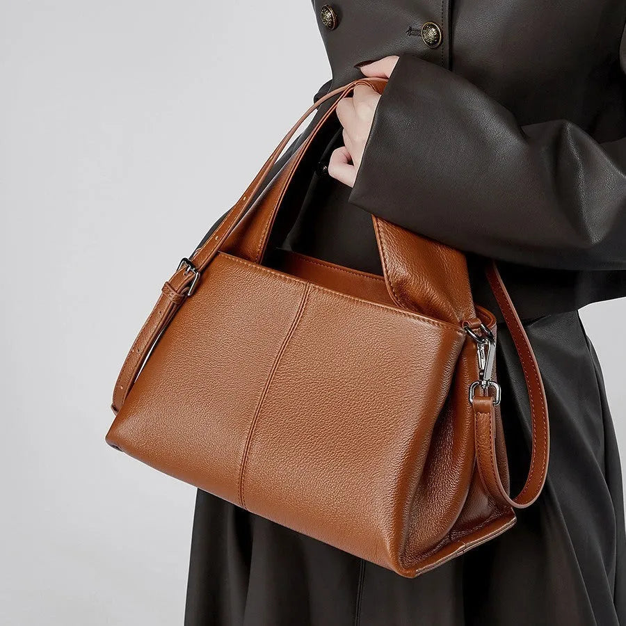 Genuine cowhide leather women's messenger bag in solid colour with double shoulder straps